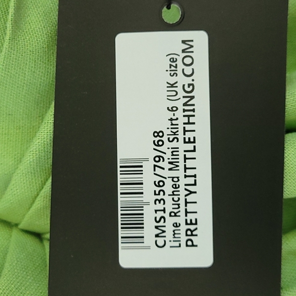 Green sinched skirt with slit - Picture 2 of 2